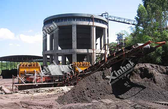 A picture shows the tailings reprocessing process